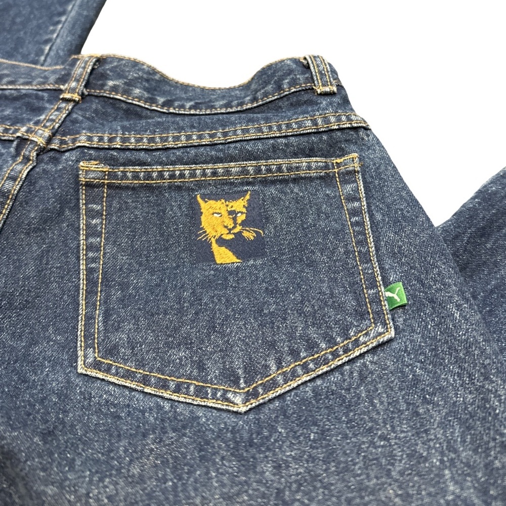 VINTAGE PUMA unisex high-waisted dark wash embroidered panther jeans, size 31.